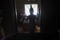 Nadira, 7 years gold, walk into her family room at the Pajam village in Kaledupa Island,  Wakatobi regency, Southeast Sulawesi, on Sunday, Sept. 17, 2017.  Antara/Rosa Panggabean