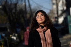 Keep calm and be average: China's unambitious millennials