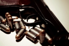 Indonesian arrested at Surabaya airport carrying 400 bullets 'from US'