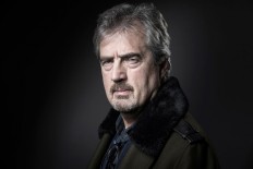 Irish playwright, novelist and poet Sebastian Barry poses during a photo session in Paris on December 5, 2017. 