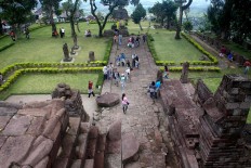 Visitors enjoy their time at Sukuh temple. JP/Maksum Nur Fauzan