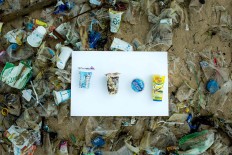 Irresponsible: Plastic cups on Kuta Beach. JP/Agung Parameswara.