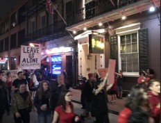  Strippers march in New Orleans to protest club closures 