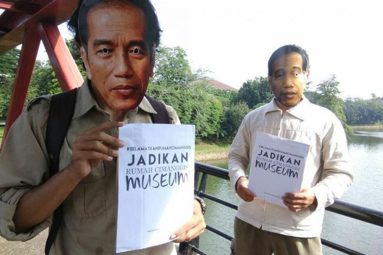 Protesters wear Jokowi masks to demand heritage protection