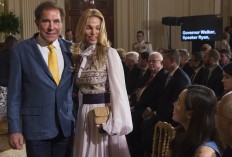 In this file photo taken on July 26, 2017 US casino owner Steve Wynn and his wife, Andrea, attend an announcement that Foxconn, an electronics supplier, will open a manufacturing facility in Wisconsin, during an event in the East Room of the White House in Washington, DC. 