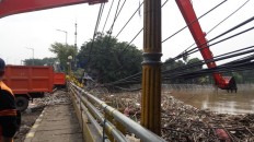 Floods see 1,596 tons of garbage removed from Ciliwung River
