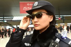 Chinese police don high-tech glasses to nab suspects