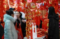 Millions of Chinese leave for Lunar holidays, but many may not return