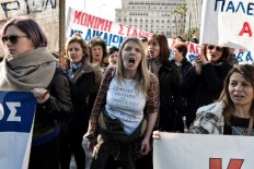 Fitch raises Greece's debt rating, citing stability, growth