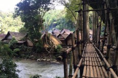 The bamboo bridge made by the Baduy people is seen at the Gajebo kampong, Baduy cultural village or Kanekes village, Leuwidamar district, Lebak regency, Banten, on Saturday, Feb. 17, 2018. 