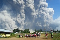 Mt. Sinabung spews massive smoke-and-ash column