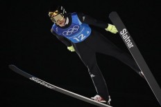 'Flying moustache' leads Norway to Olympic ski jump gold