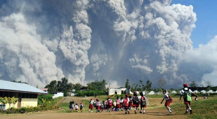 Villages covered in ash as Mount Sinabung erupts