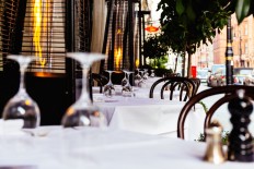 Outdoor luxury restaurant terrace tables and chairs in Mayfair London