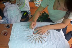 A visitor creates her own batik motif. JP/Endro Prakoso
