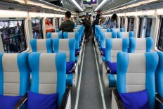 Passengers get situated on a new Argo Parahyangan train at Bandung Station prior to departing for Gambir Station, Jakarta.