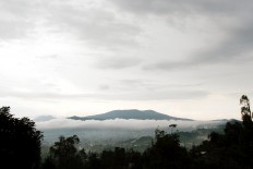 Serenity now: A breathtaking view of Mount Tangkuban Perahu from the Bale Restaurant in West Java.