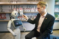 Pizza Hut deploys robot to serve up quicker service