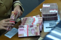 Rupiah at 1998 crisis level pressures reserves, foreign-denominated debt