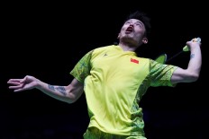 Lin Dan stunned by Shi in All England Open final