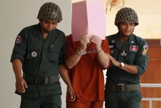  Briton given suspended sentence for Cambodia 'porno' pool party photos 