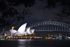 Sydney goes dark as global Earth Hour climate campaign kicks off