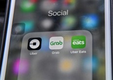 Grab to cut more costs amid economic chill