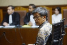 Businessman indicted for graft in e-ID case