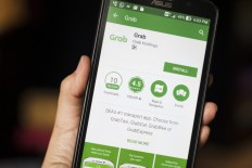 Grab launches new ride hailing app services