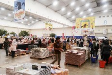 Visitors attend Big Bad Wolf 2018 at the Indonesia Convention Exhibition in Tangerang on March 28, 2018.