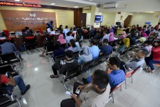 Government sees lower deficit in September