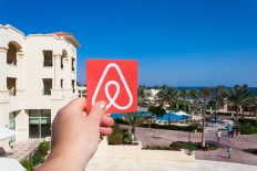 Two Singaporean Airbnb hosts were Tuesday fined Sg$60,000 ($45,800) each for letting out apartments without official permission.