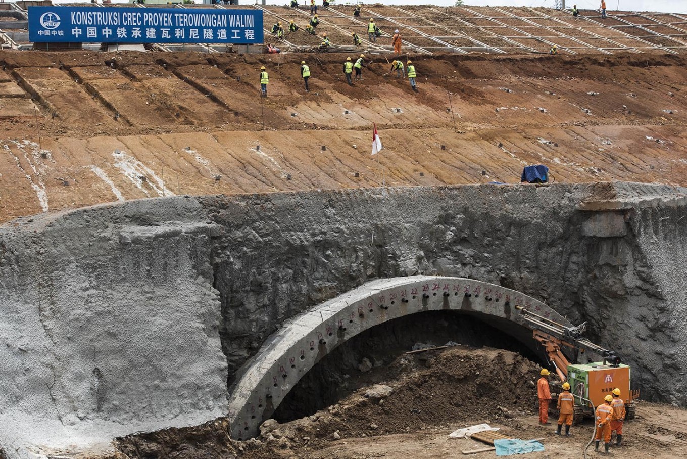 Workers construct a tunnel, which is part of the Jakarta-Bandung high-speed train project, in West Bandung  regency, West Java, on March 21. 