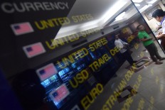 Looming US-China currency war to have little impact on rupiah: Analysts