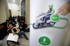  Grab to operate in 120 Indonesian cities after Uber acquisition