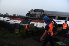 One killed, three injured in East Java truck-train collision