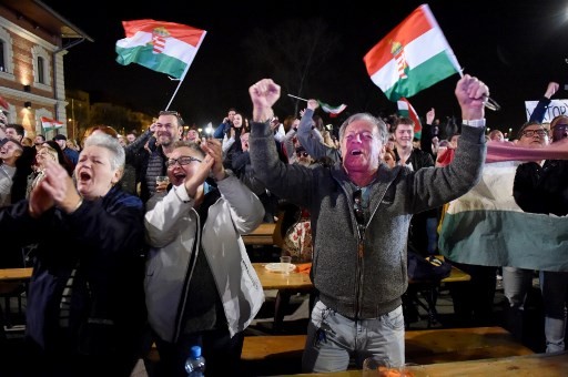 Hungary's PM Orban claims victory as his party takes sweeping poll lead