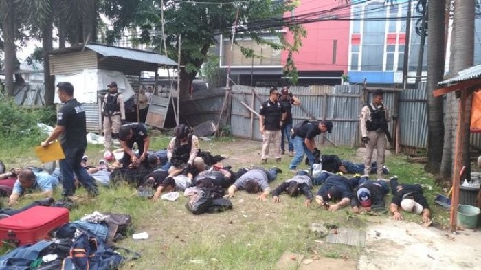 Dangerous work: West Jakarta Police arrest 21 men carrying sharp weapons.