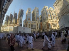 Rising up: New high-rise buildings loom in Mecca as the city is increasing its capacity to accommodate more pilgrims. The Saudi monarchy plans to welcome some 30 million pilgrims a year, both for the haj and the year-round umrah, by 2030. JP/Endy M Bayuni