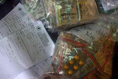 Medicines are prepared for distribution. JP/Maksum Nur Fauzan