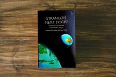 In Strangers Next Door?, 29 writers, mostly Australian academics, attempt to explore a weird link based on geography and little else.