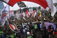 Ministry cancels plan to prohibit discounts on online 'ojek' services