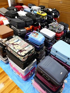 Japan airports wrestle with how to handle abandoned suitcases