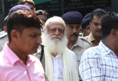 Indian court jails popular guru for life over teen rape