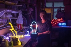 Neon nostalgia in Hong Kong as lights go out