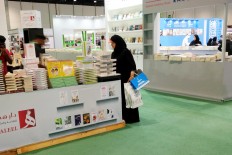 Bookworm’s heaven: Visitors checking out books exhibited at one of the booths at the Abu Dhabi International Book Fair 2018, which runs from April 25 to May 1 at the Abu Dhabi National Exhibition Centre.