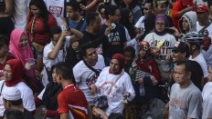 Rally participants asked to change t-shirts before entering CFD