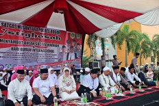 Bogor workers celebrate May Day with mass prayer