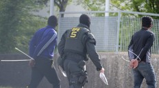 German police raid refugee centre after violent stand-off