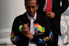Jokowi shows support for Asian Games with customized jacket 